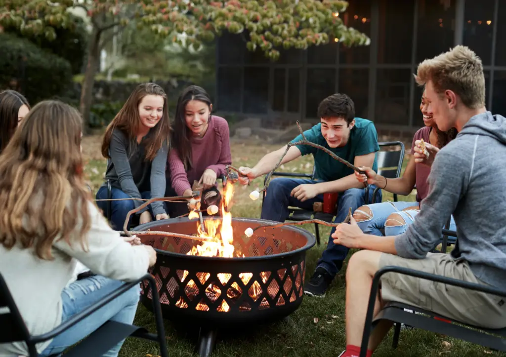 Family around the fire pit